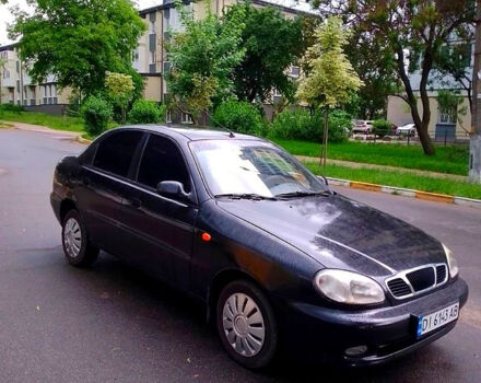 Чорний Деу Ланос, об'ємом двигуна 1.4 л та пробігом 162 тис. км за 1430 $, фото 1 на Automoto.ua