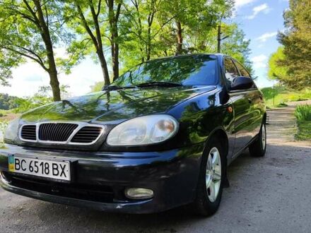 Черный Дэу Ланос, объемом двигателя 1.4 л и пробегом 165 тыс. км за 1450 $, фото 1 на Automoto.ua