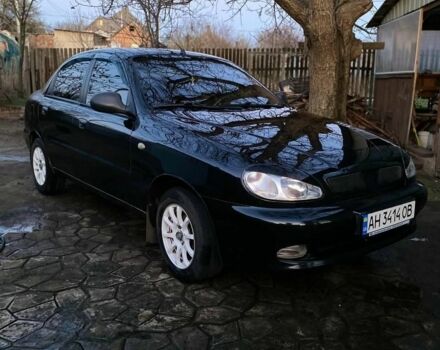 Черный Дэу Ланос, объемом двигателя 1.5 л и пробегом 1000 тыс. км за 2600 $, фото 1 на Automoto.ua