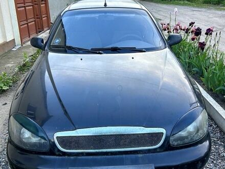 Деу Ланос 2008 у Харкові на Automoto.ua Чорний Деу Ланос, об'ємом двигуна 1.5 л та пробігом 209 тис. км за 800 $, фото 1 на Automoto.ua
