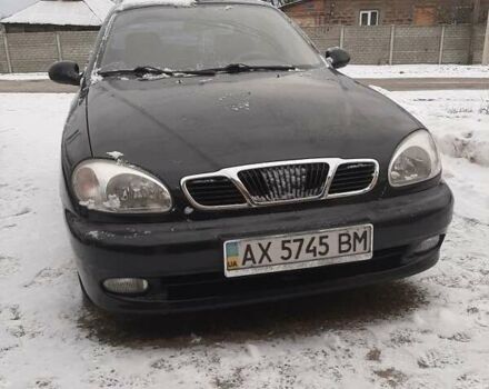 Черный Дэу Ланос, объемом двигателя 1.5 л и пробегом 189 тыс. км за 2100 $, фото 1 на Automoto.ua