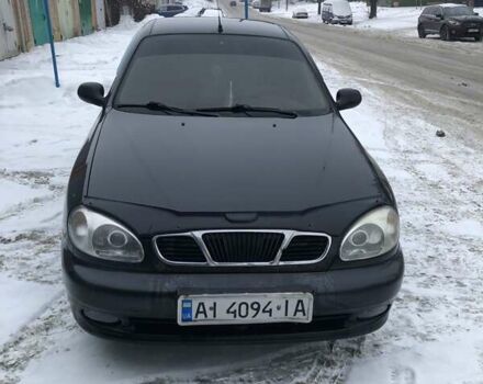 Черный Дэу Ланос, объемом двигателя 1.5 л и пробегом 330 тыс. км за 1500 $, фото 1 на Automoto.ua