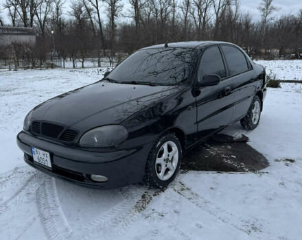 Чорний Деу Ланос, об'ємом двигуна 1.5 л та пробігом 160 тис. км за 2650 $, фото 1 на Automoto.ua