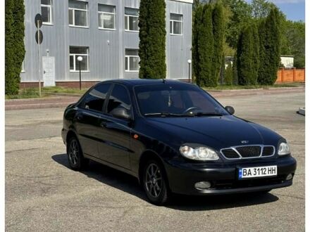 Черный Дэу Ланос, объемом двигателя 1.5 л и пробегом 255 тыс. км за 2800 $, фото 1 на Automoto.ua