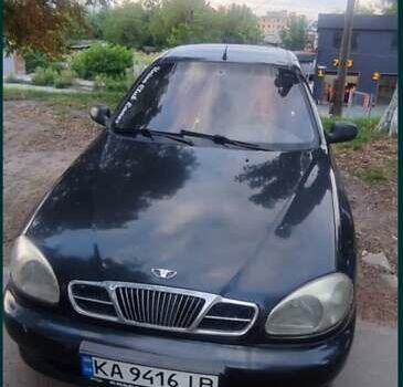 Черный Дэу Ланос, объемом двигателя 1.5 л и пробегом 247 тыс. км за 1600 $, фото 1 на Automoto.ua