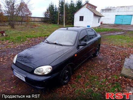 Чорний Деу Ланос, об'ємом двигуна 1.4 л та пробігом 150 тис. км за 1300 $, фото 1 на Automoto.ua