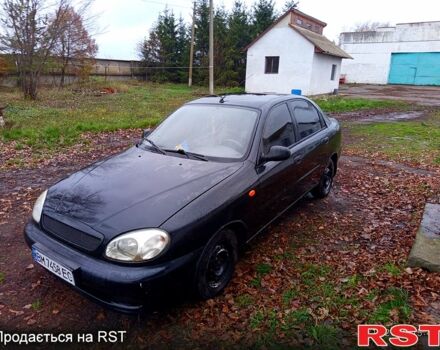 Чорний Деу Ланос, об'ємом двигуна 1.4 л та пробігом 150 тис. км за 1300 $, фото 1 на Automoto.ua