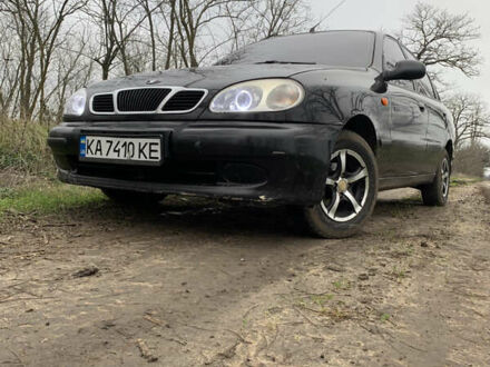 Чорний Деу Ланос, об'ємом двигуна 1.5 л та пробігом 119 тис. км за 2590 $, фото 1 на Automoto.ua