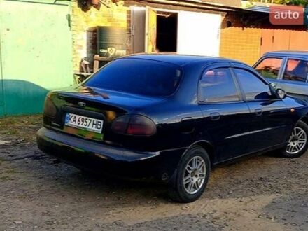 Чорний Деу Ланос, об'ємом двигуна 1.39 л та пробігом 233 тис. км за 2200 $, фото 1 на Automoto.ua