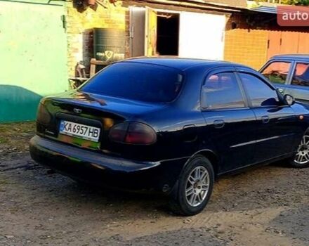 Черный Дэу Ланос, объемом двигателя 1.39 л и пробегом 233 тыс. км за 2200 $, фото 1 на Automoto.ua