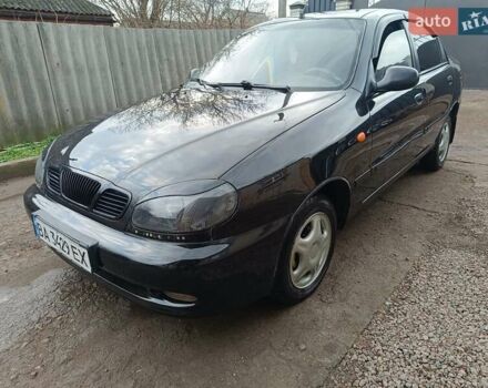 Черный Дэу Ланос, объемом двигателя 1.5 л и пробегом 200 тыс. км за 2100 $, фото 1 на Automoto.ua