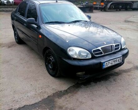 Черный Дэу Ланос, объемом двигателя 1.6 л и пробегом 230 тыс. км за 1400 $, фото 1 на Automoto.ua