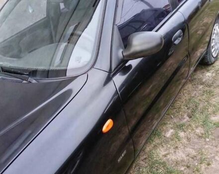 Чорний Деу Ланос, об'ємом двигуна 1.5 л та пробігом 200 тис. км за 2300 $, фото 1 на Automoto.ua