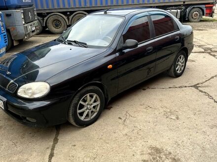 Чорний Деу Ланос, об'ємом двигуна 1.6 л та пробігом 287 тис. км за 2400 $, фото 1 на Automoto.ua