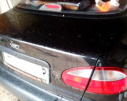 Чорний Деу Ланос, об'ємом двигуна 1.5 л та пробігом 170 тис. км за 2200 $, фото 1 на Automoto.ua