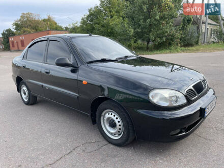 Черный Дэу Ланос, объемом двигателя 1.5 л и пробегом 122 тыс. км за 2950 $, фото 1 на Automoto.ua