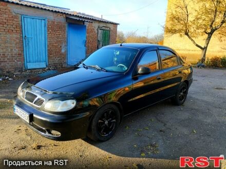 Чорний Деу Ланос, об'ємом двигуна 1.6 л та пробігом 238 тис. км за 2700 $, фото 1 на Automoto.ua