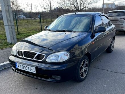 Черный Дэу Ланос, объемом двигателя 1.6 л и пробегом 326 тыс. км за 2700 $, фото 1 на Automoto.ua