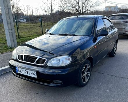 Черный Дэу Ланос, объемом двигателя 1.6 л и пробегом 326 тыс. км за 2700 $, фото 1 на Automoto.ua