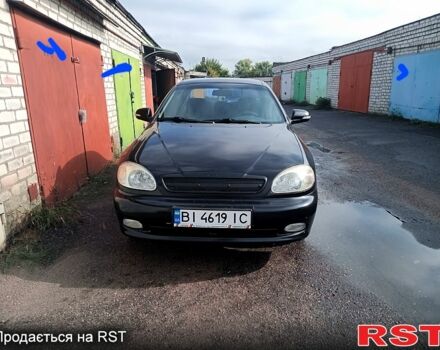 Черный Дэу Ланос, объемом двигателя 1.5 л и пробегом 264 тыс. км за 2500 $, фото 1 на Automoto.ua