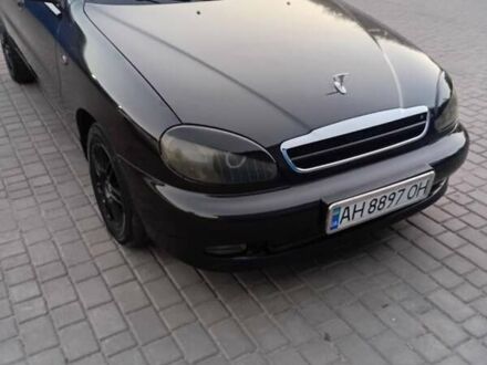 Черный Дэу Ланос, объемом двигателя 1.6 л и пробегом 222 тыс. км за 3100 $, фото 1 на Automoto.ua