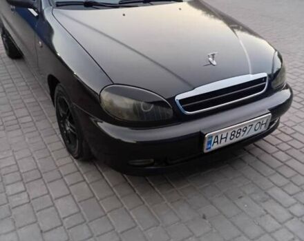 Чорний Деу Ланос, об'ємом двигуна 1.6 л та пробігом 222 тис. км за 3100 $, фото 1 на Automoto.ua