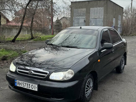 Черный Дэу Ланос, объемом двигателя 1.5 л и пробегом 270 тыс. км за 2550 $, фото 1 на Automoto.ua