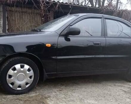 Чорний Деу Ланос, об'ємом двигуна 1.5 л та пробігом 21 тис. км за 4500 $, фото 1 на Automoto.ua