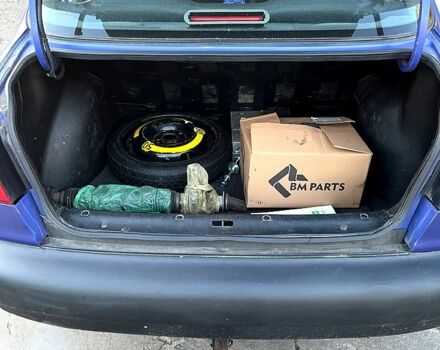 Фиолетовый Дэу Ланос, объемом двигателя 1.5 л и пробегом 220 тыс. км за 1300 $, фото 9 на Automoto.ua