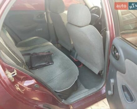 Фиолетовый Дэу Ланос, объемом двигателя 1.5 л и пробегом 280 тыс. км за 2000 $, фото 6 на Automoto.ua