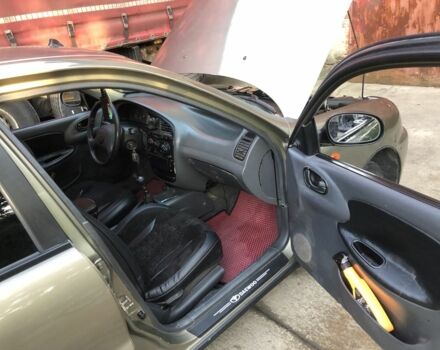 Коричневый Дэу Ланос, объемом двигателя 1.5 л и пробегом 302 тыс. км за 2300 $, фото 3 на Automoto.ua