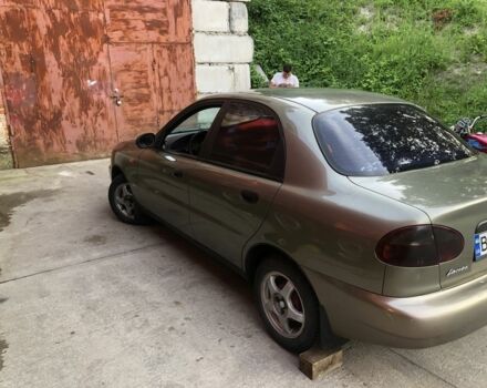 Коричневый Дэу Ланос, объемом двигателя 1.5 л и пробегом 302 тыс. км за 2300 $, фото 2 на Automoto.ua