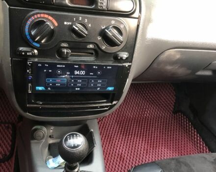 Коричневый Дэу Ланос, объемом двигателя 1.5 л и пробегом 302 тыс. км за 2300 $, фото 4 на Automoto.ua