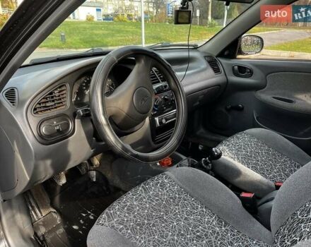 Коричневый Дэу Ланос, объемом двигателя 1.5 л и пробегом 195 тыс. км за 2350 $, фото 6 на Automoto.ua