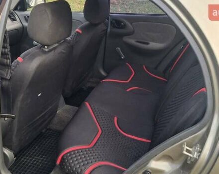 Коричневый Дэу Ланос, объемом двигателя 1.4 л и пробегом 150 тыс. км за 1750 $, фото 4 на Automoto.ua