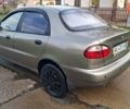 Коричневый Дэу Ланос, объемом двигателя 1.4 л и пробегом 150 тыс. км за 1750 $, фото 6 на Automoto.ua