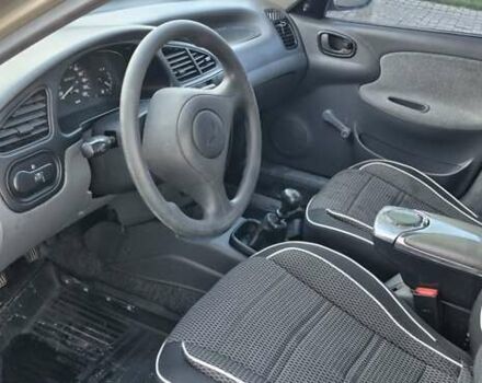 Коричневый Дэу Ланос, объемом двигателя 0 л и пробегом 150 тыс. км за 2500 $, фото 3 на Automoto.ua