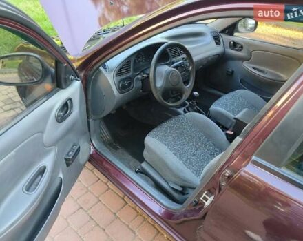 Коричневый Дэу Ланос, объемом двигателя 1.6 л и пробегом 110 тыс. км за 2500 $, фото 8 на Automoto.ua