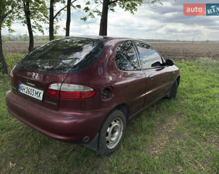 Червоний Деу Ланос, об'ємом двигуна 1.5 л та пробігом 220 тис. км за 1650 $, фото 4 на Automoto.ua