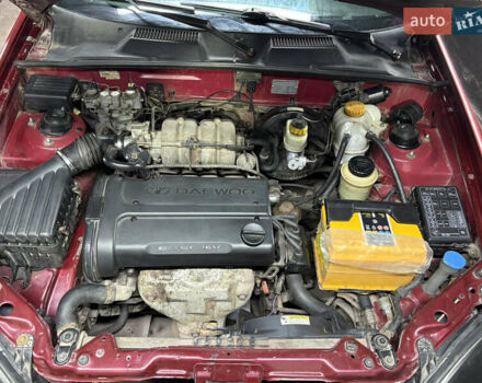 Красный Дэу Ланос, объемом двигателя 1.6 л и пробегом 200 тыс. км за 2000 $, фото 8 на Automoto.ua