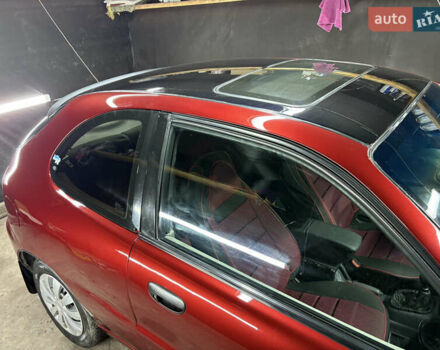 Красный Дэу Ланос, объемом двигателя 1.6 л и пробегом 200 тыс. км за 2000 $, фото 5 на Automoto.ua