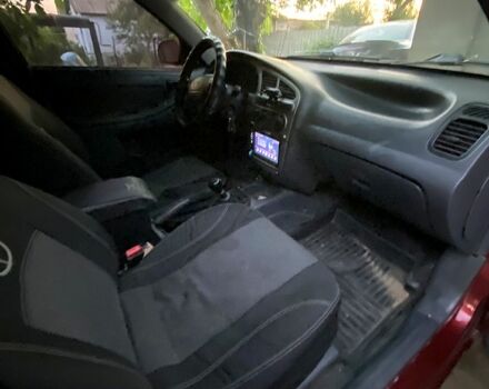 Дэу Ланос 2002 в Николаеве на Automoto.ua Красный Дэу Ланос, объемом двигателя 1.6 л и пробегом 200 тыс. км за 1700 $, фото 8 на Automoto.ua