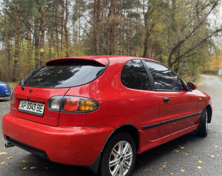 Красный Дэу Ланос, объемом двигателя 1.6 л и пробегом 235 тыс. км за 2350 $, фото 2 на Automoto.ua