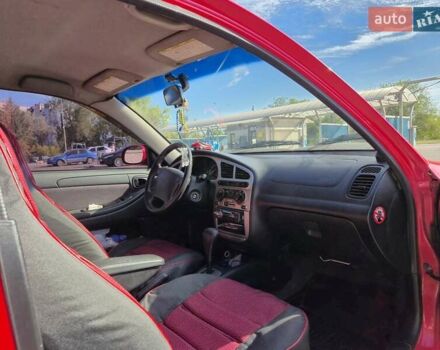 Красный Дэу Ланос, объемом двигателя 1.6 л и пробегом 249 тыс. км за 3300 $, фото 6 на Automoto.ua
