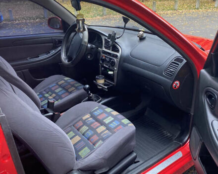 Красный Дэу Ланос, объемом двигателя 1.6 л и пробегом 235 тыс. км за 2350 $, фото 5 на Automoto.ua