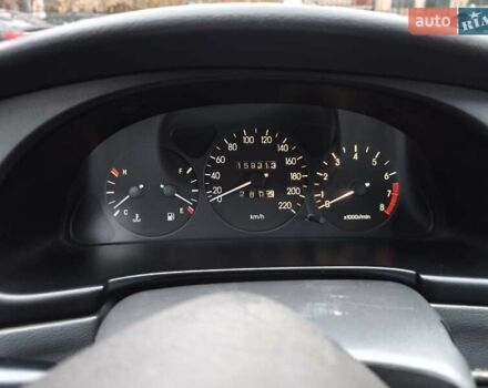 Красный Дэу Ланос, объемом двигателя 1.5 л и пробегом 160 тыс. км за 2750 $, фото 7 на Automoto.ua