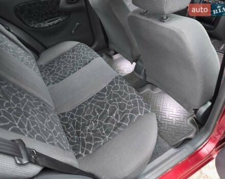 Красный Дэу Ланос, объемом двигателя 1.5 л и пробегом 160 тыс. км за 2750 $, фото 10 на Automoto.ua