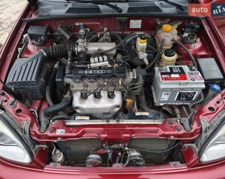 Красный Дэу Ланос, объемом двигателя 1.5 л и пробегом 160 тыс. км за 2750 $, фото 13 на Automoto.ua