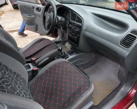 Красный Дэу Ланос, объемом двигателя 1.5 л и пробегом 160 тыс. км за 2750 $, фото 11 на Automoto.ua