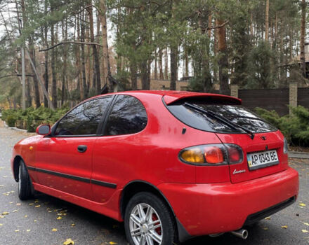 Красный Дэу Ланос, объемом двигателя 1.6 л и пробегом 235 тыс. км за 2350 $, фото 3 на Automoto.ua